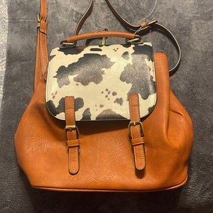 Brown/tan cow print backpack purse